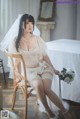 Coser@rioko凉凉子 Vol.073: 透明婚纱 (39 photos)